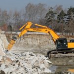 Excavator-based hydraulic hammer: design and application