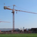 What algorithm is used to assemble and dismantle a tower crane?